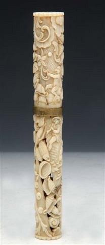 Appraisal: A EUROPEAN CARVED IVORY NEEDLE CASE of cylindrical form intricately