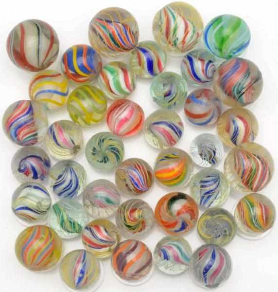 Appraisal: Lot of Solid Core Swirl Marbles Includes multicolored solid core