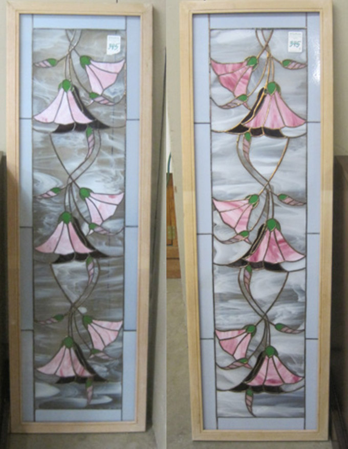 Appraisal: A PAIR OF STAINED AND LEADED GLASS WINDOWS a matching