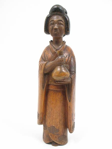 Appraisal: A Japanese wood carving of a Bijin height in diameter