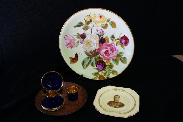 Appraisal: A ceramic salver floral decorated together with four Crown Devon