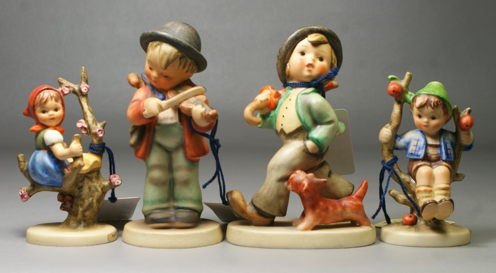 Appraisal: Hummel figurines Apple Tree Girl Hum some crazing Apple Tree