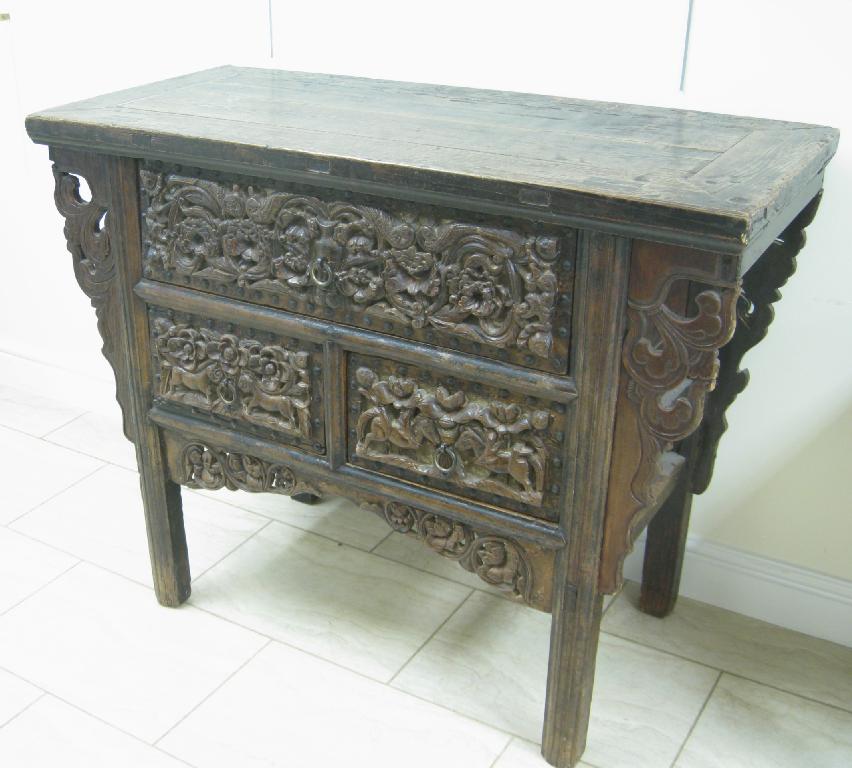 Appraisal: A Chinese Side Cabinet fitted one long and two short