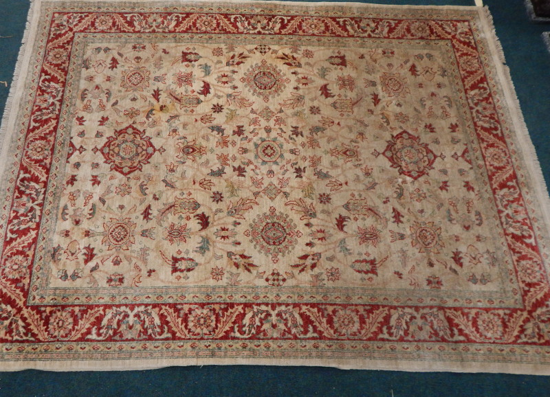 Appraisal: A Zeigler type carpet with a design of medallions leaves