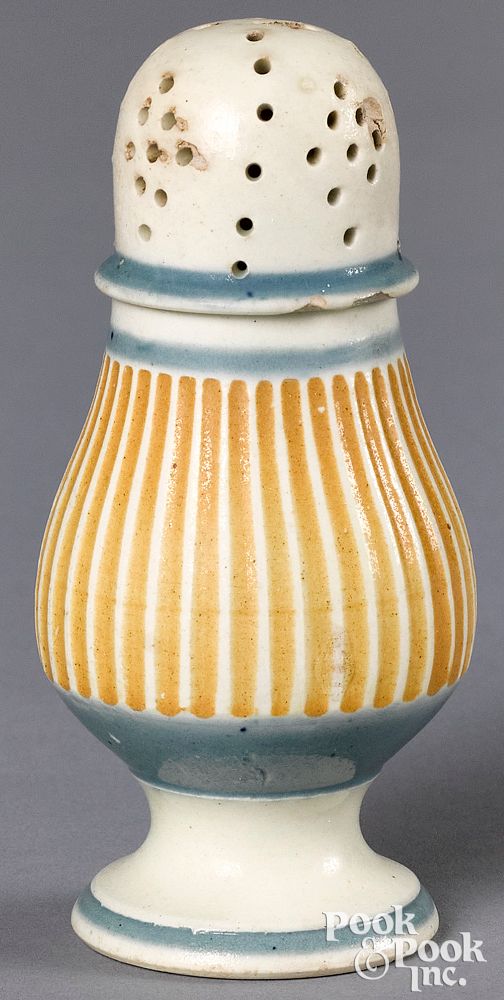 Appraisal: Mocha pepperpot Mocha pepperpot with yellow fluted body and blue