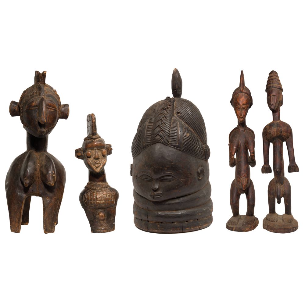 Appraisal: AFRICAN CARVED WOOD ASSORTMENT items including female New Guinea items