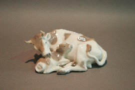 Appraisal: A Royal Copenhagen model of a cow and calf