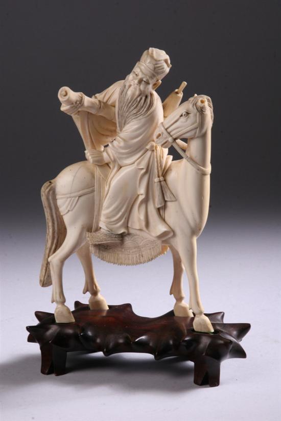 Appraisal: CHINESE IVORY FIGURAL GROUP Carved to depict immortal on horseback