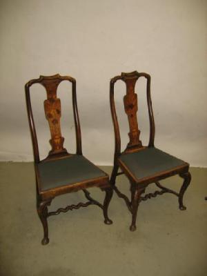 Appraisal: A PAIR OF WALNUT AND FLORAL MARQUETRY SIDE CHAIRS the