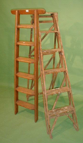 Appraisal: Two vintage wooden step ladders