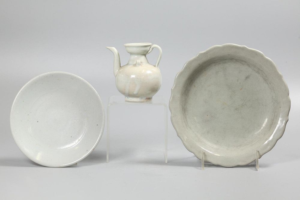 Appraisal: Chinese white glazed ceramic wares possibly th c or older