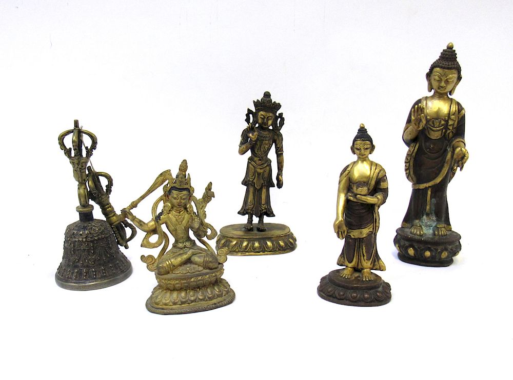 Appraisal: Group of Buddhist Figural Bronzes and Vajra Four parcel gilt