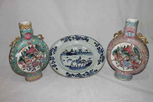 Appraisal: A PAIR OF CHINESE PINK GROUND MOON FLASKS decorated with