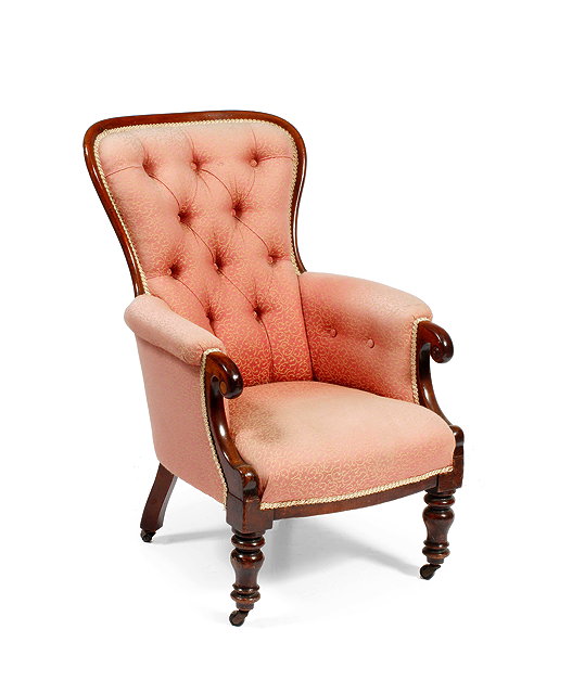 Appraisal: A VICTORIAN MAHOGANY ARMCHAIR the shaped button upholstered back and