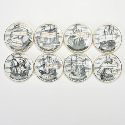 Appraisal: PIERO FORNASETTI Set of eight Velieri coasters Italy th c