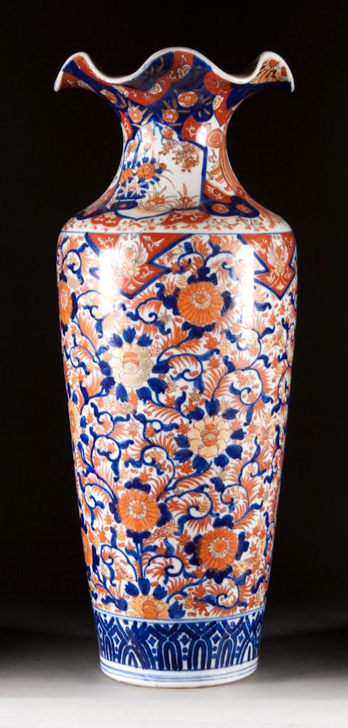 Appraisal: Japanese Imari porcelain temple vase circa with flared top in