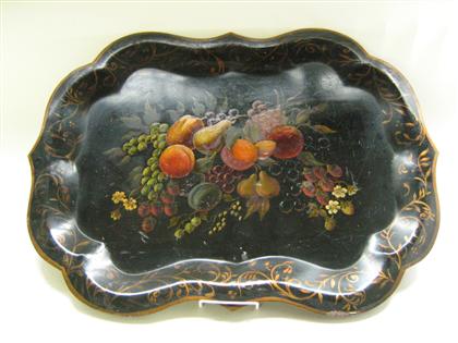 Appraisal: Four painted and decorated tin trays th century One octagonal