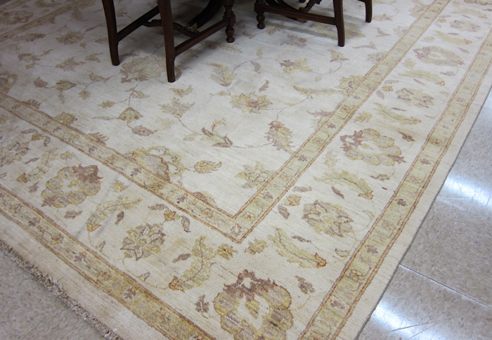 Appraisal: HAND KNOTTED ORIENTAL CARPET Pakistani Oushak overall meandering floral vine