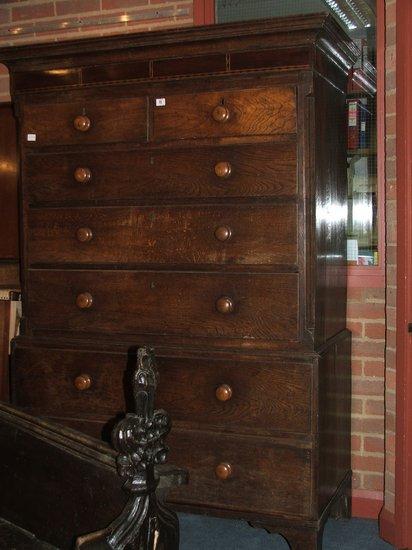 Appraisal: A NORTH GEORGIAN COUNTRY OAK TALLBOY in two parts fitted