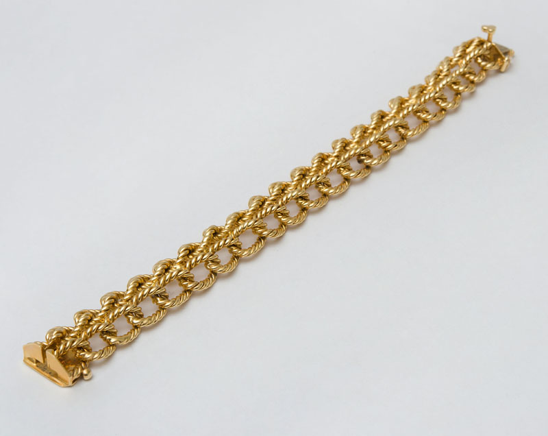 Appraisal: K GOLD BRAIDED ROPE BRACELET Stamped 'E k' in approx