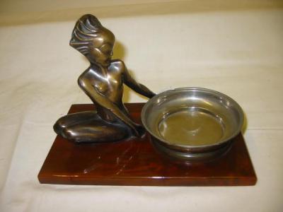 Appraisal: AN AUSTRIAN ART DECO FIGURAL DISH comprising detachable circular dish