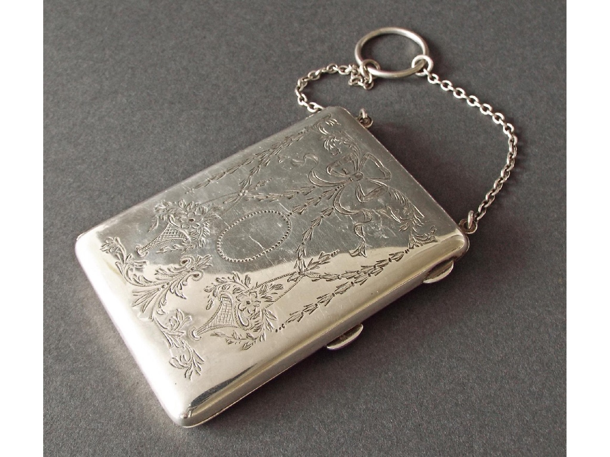 Appraisal: Early th century silver purse on chain fitted with a