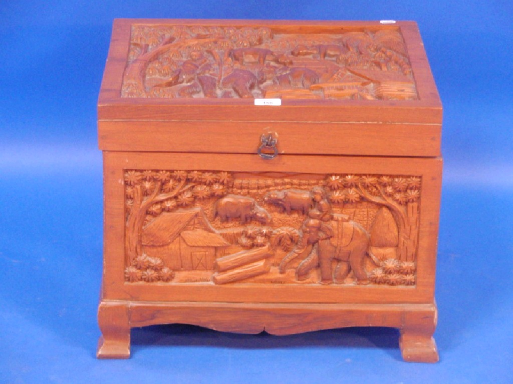 Appraisal: A small oriental carved camphor wood chest