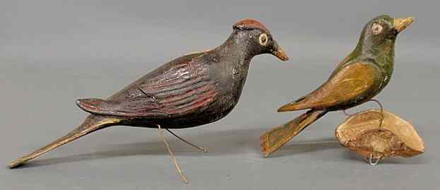 Appraisal: Two Continental carved birds late th c largest l