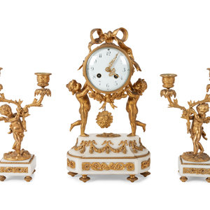 Appraisal: French Gilt Bronze and Marble Clock Garniture featuring a gilt