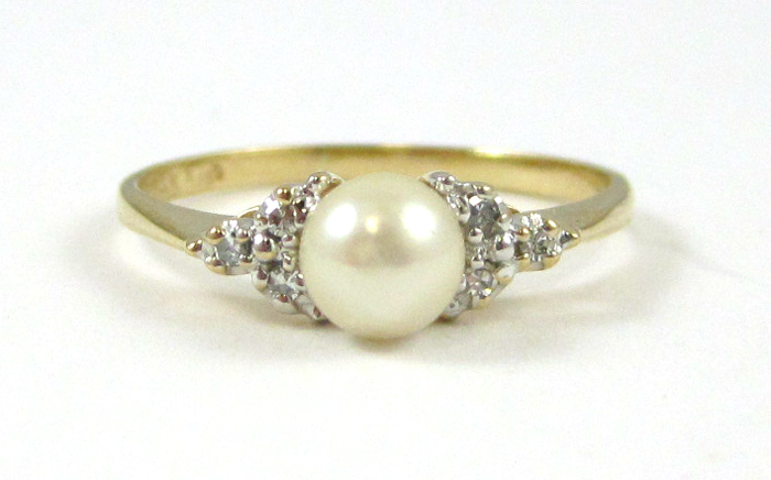 Appraisal: PEARL DIAMOND AND FOURTEEN KARAT GOLD RING set with three