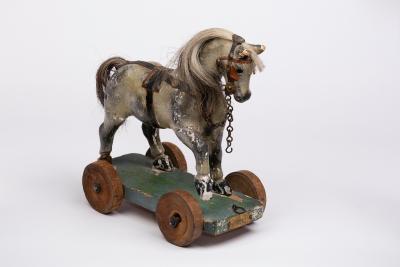 Appraisal: A child's toy horse on wheels label to front Benetfink