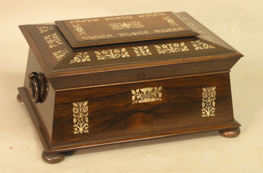 Appraisal: An early Victorian rosewood and mother of pearl inlaid work