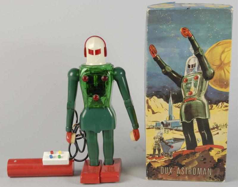 Appraisal: Plastic Dux-Astroman Battery-Operated Toy Description German Working Remote control Marked