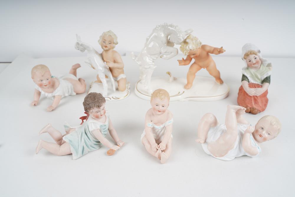 Appraisal: LOT OF SEVEN GERMAN PORCELAIN FIGURESmost stamped Schaubachkunst Germany to