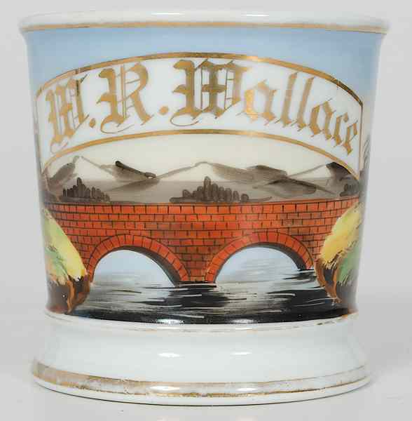 Appraisal: Bridge Builder Occupational Shaving Mug Porcelain with polychrome painted scene