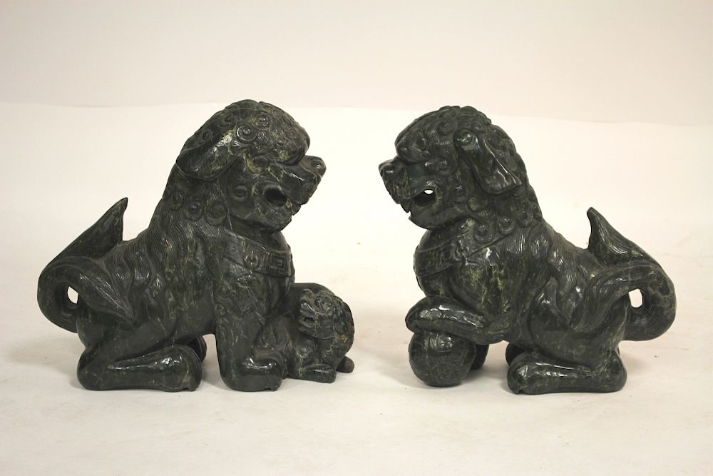 Appraisal: Chinese Large Spinach Jade Guardian Lions Seated Female weighs pounds