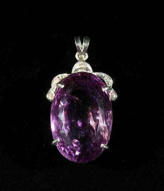 Appraisal: WHITE GOLD DIAMOND AND AMETHYST PENDANT Oval amethyst weighing approx