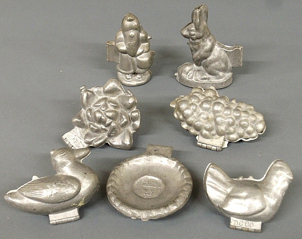 Appraisal: - Seven early pewter ice cream molds some marked rabbit