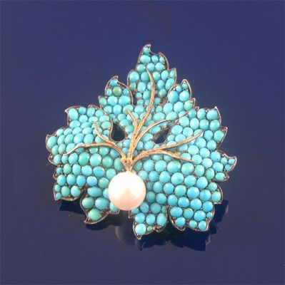 Appraisal: A th century leaf brooch set all over with turquoise