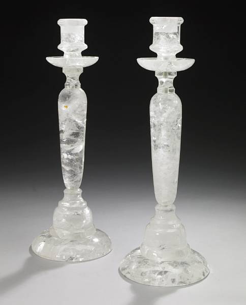 Appraisal: A pair of rock crystal candlesticks modern Each with circular