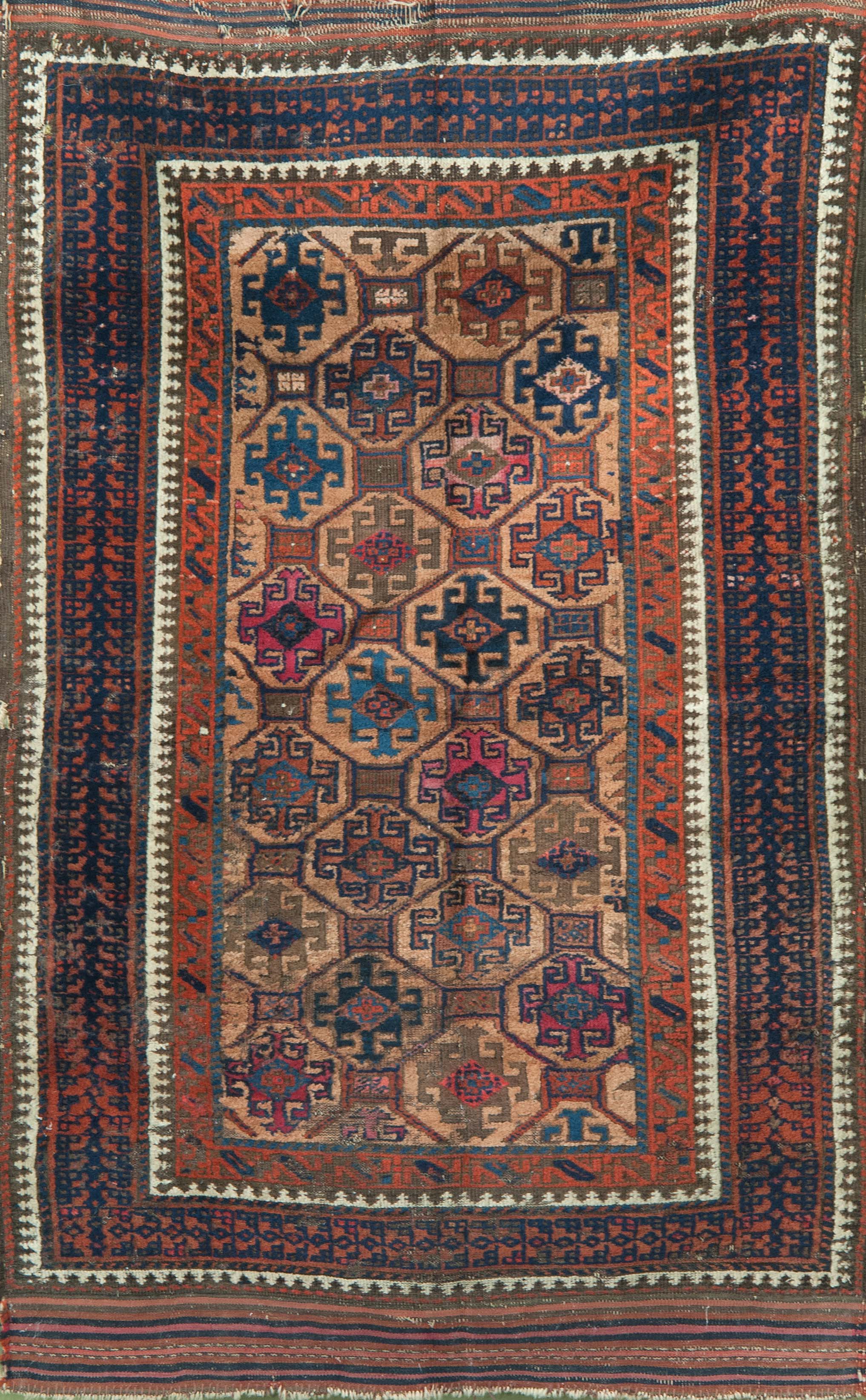 Appraisal: ORIENTAL RUG BELOUCH ' x ' Peach field with an