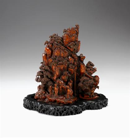 Appraisal: Large Chinese wood mountain boulder on stand The light brown