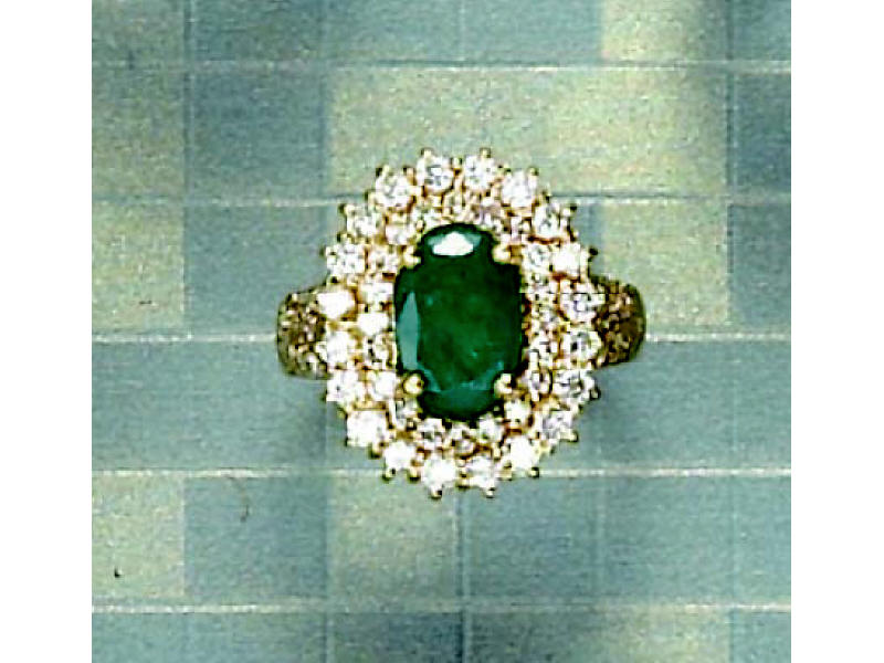 Appraisal: EMERALD AND DIAMOND RING k yellow gold lady's ring set