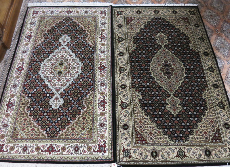 Appraisal: TWO SIMILAR HAND KNOTTED ORIENTAL AREA RUG Persian Bidjar design