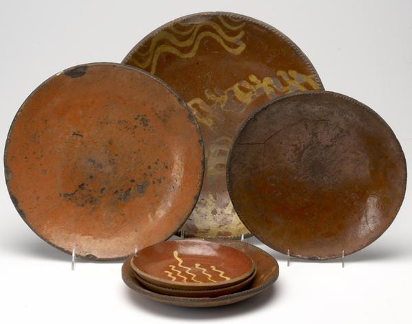 Appraisal: REDWARE Six assorted plates most with slip decoration Largest dia