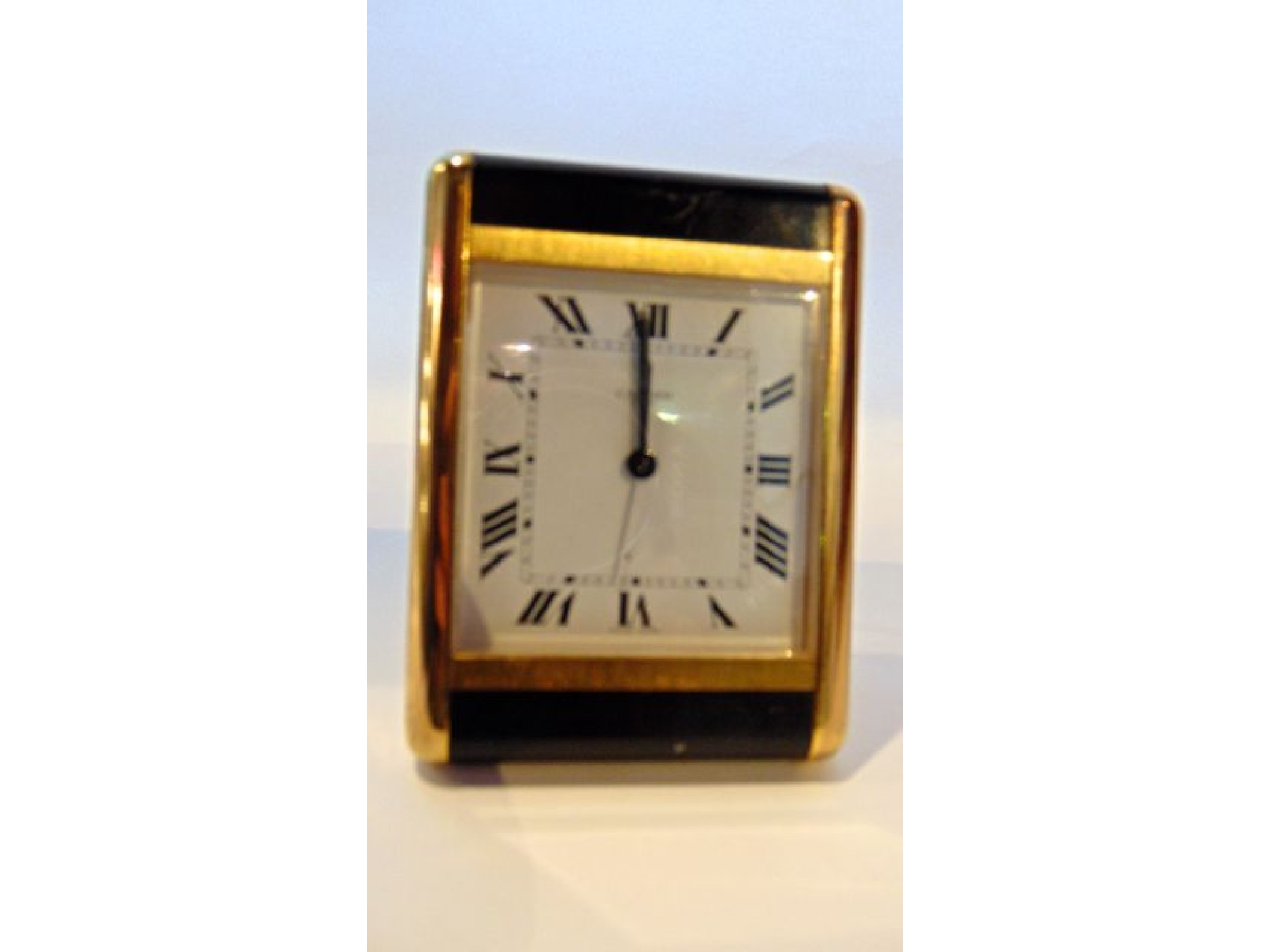 Appraisal: A Cartier rectangular bedside alarm clock with gilt brass and