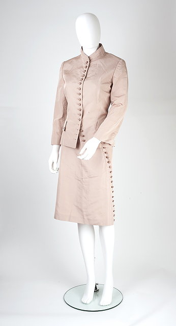 Appraisal: An Alexander McQueen pale pink skirt suit the jacket with