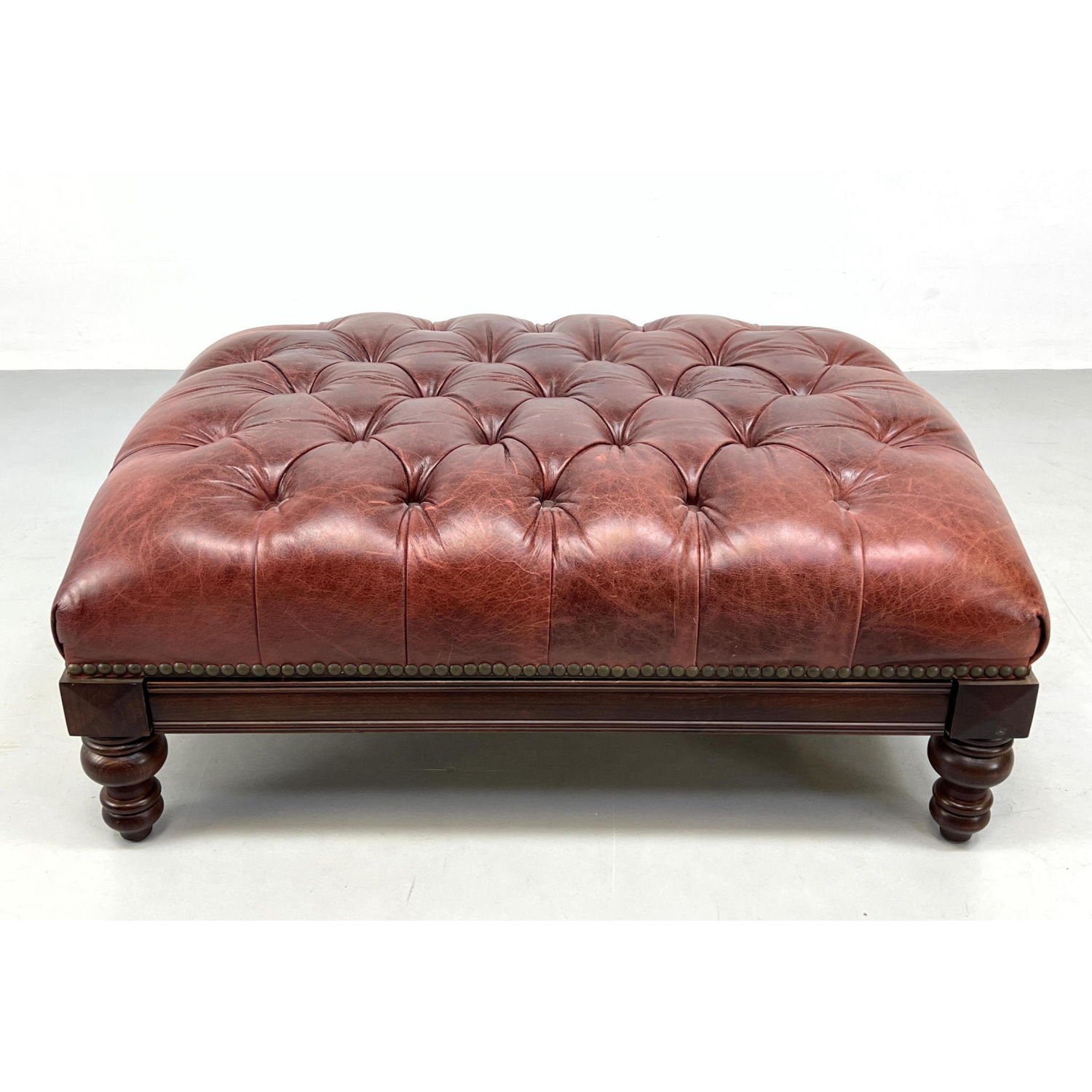 Appraisal: Tufted Leather Chesterfield style Oversized Ottoman Foot Stool Has drop