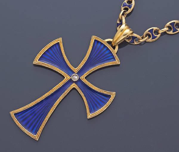 Appraisal: An enamel and diamond cruciform pendant with matching enamel chain