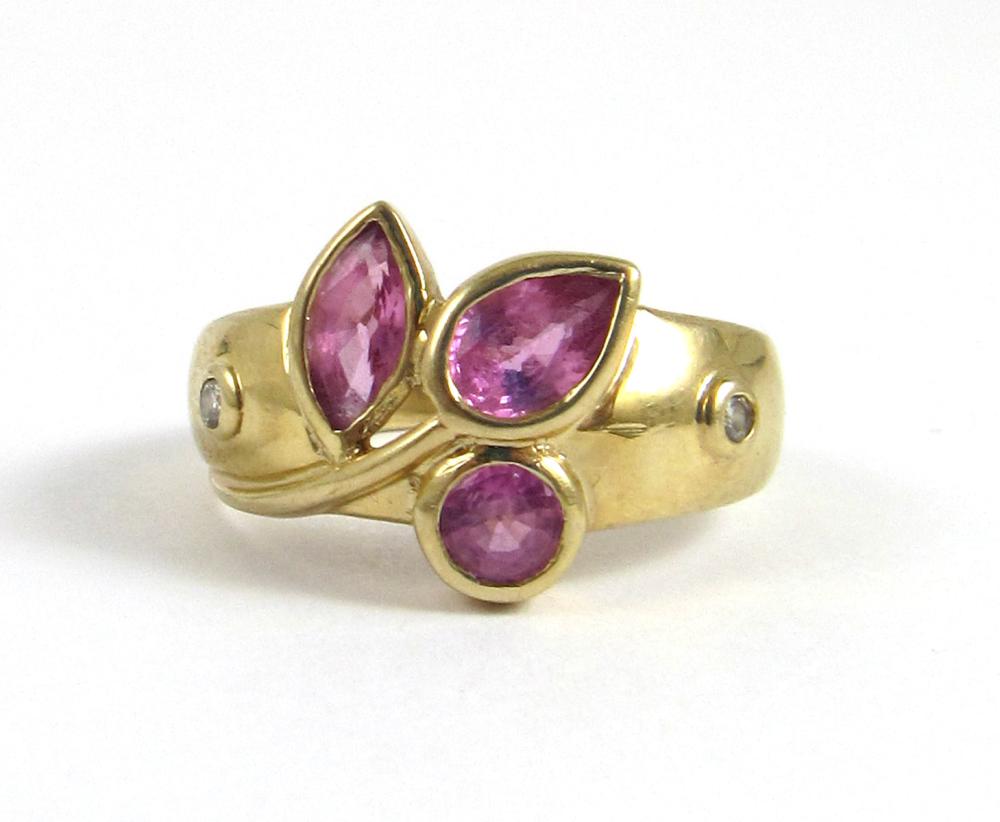 Appraisal: PINK SAPPHIRE DIAMOND AND FOURTEEN KARAT GOLD RING bezel set